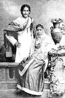 Rabindranath Tagore standing beside Mrinalini Devi
