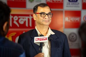Chancellor Phalguni Mookhopadhayay speaking to the press during an Republic Bangla award ceremony