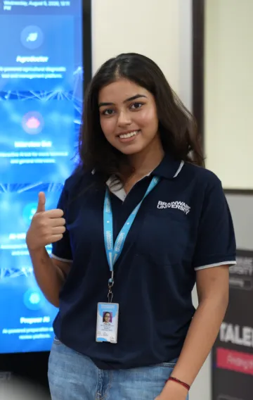 Student at the AIRDC project showcase kiosk